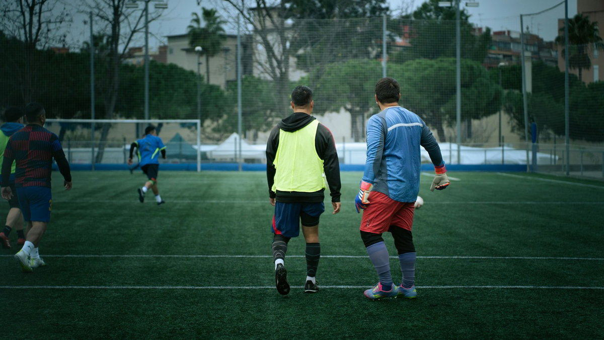 Athletes training together on a soccer field