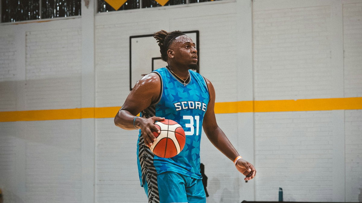 Basketball player dribbling during focused court work