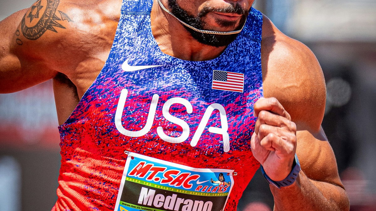 Track athlete running hard during a race