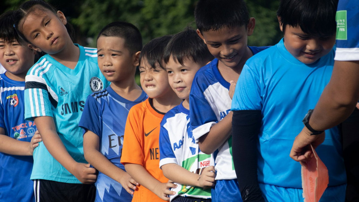 Youth soccer team standing together