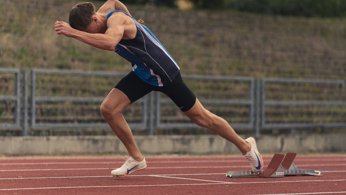 Runner starting a race on a track