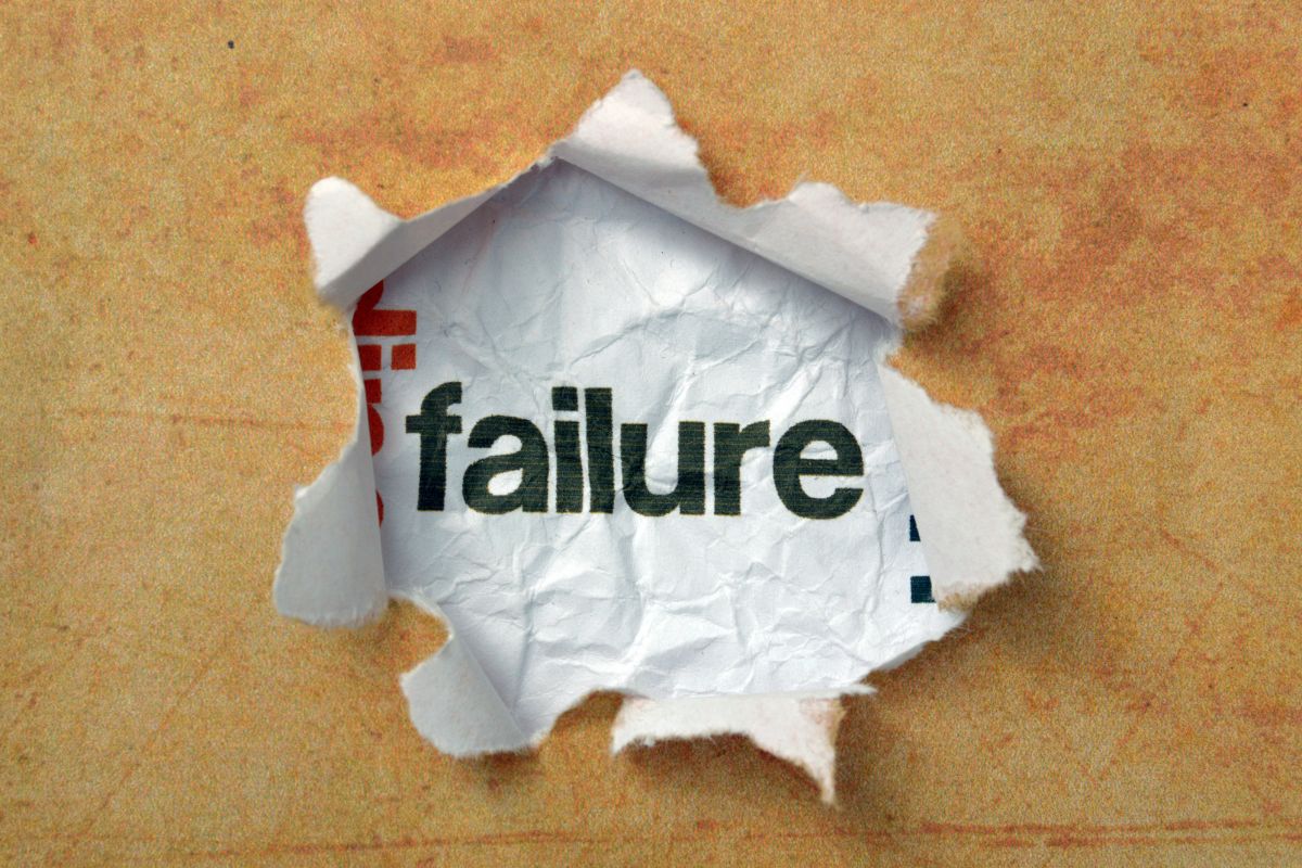 the word failure rips through a piece of paper